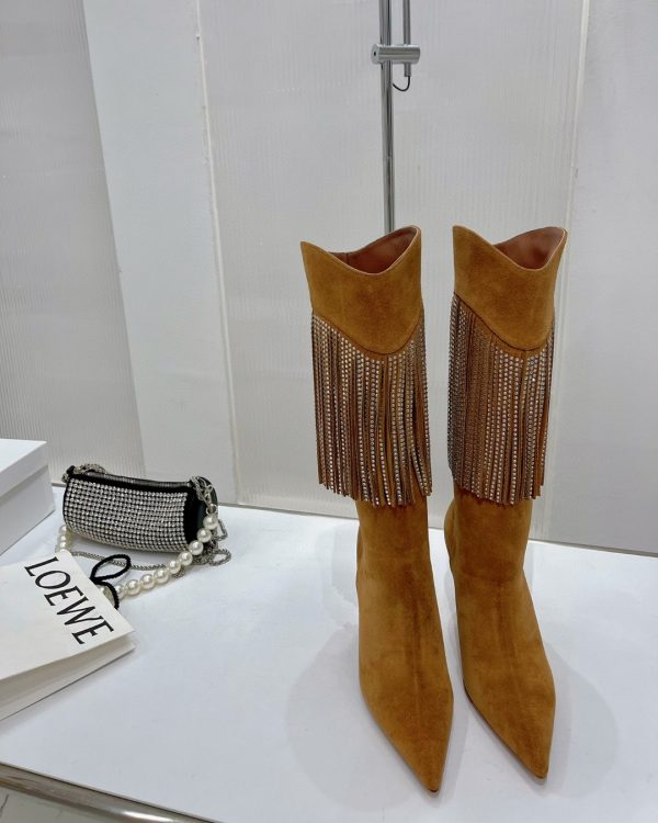 This boot is an elegant and assertive creation. Lily crystal-fringe mid-calf boots